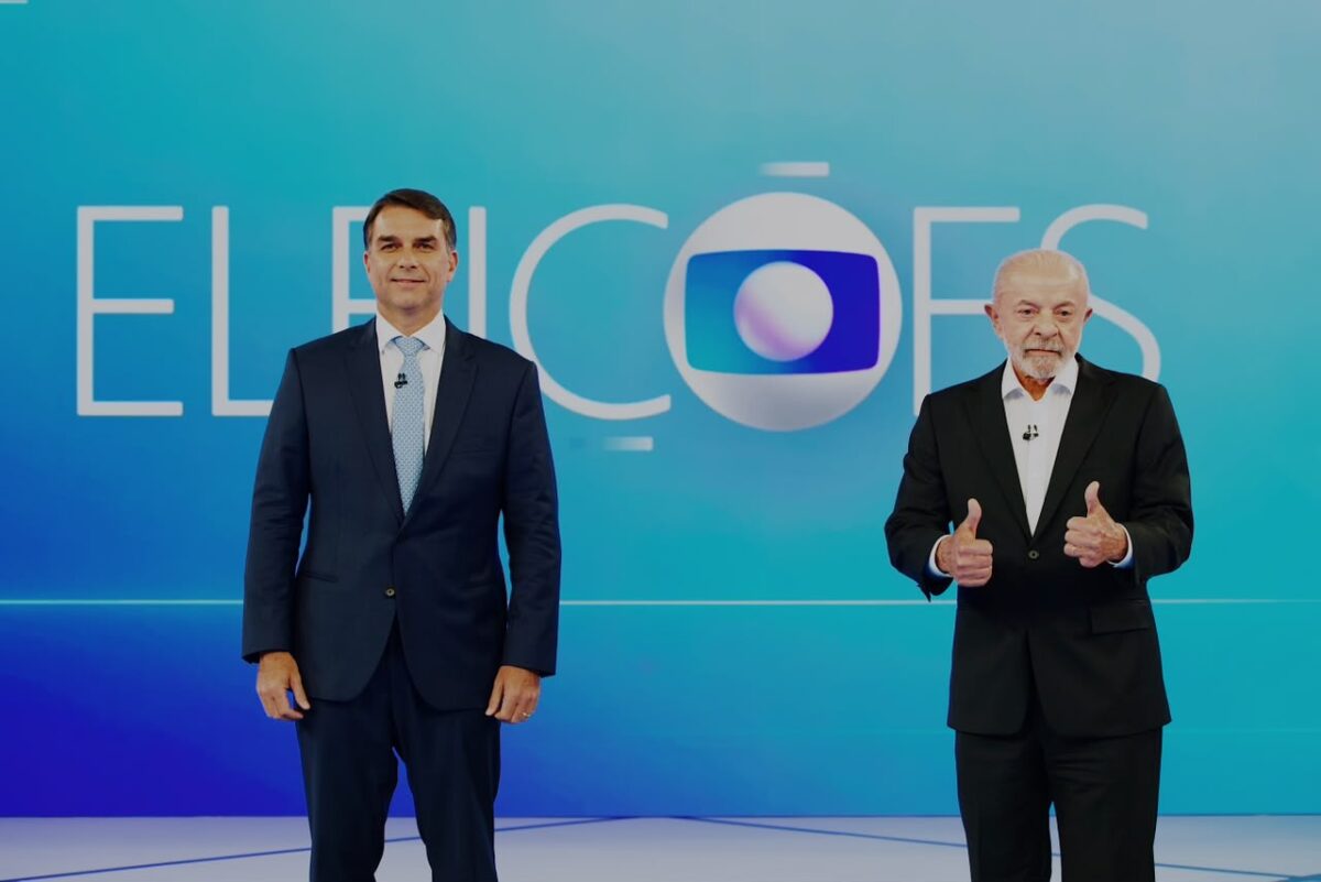 Flávio Bolsonaro e Lula participam do último debate presidencial na Globo